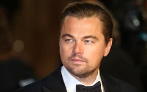 Leonardo DiCaprio poses on arrival for the BAFTA British Academy Film Awards at the Royal Opera House in London on February 14, 2016.