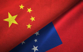 China and Samoa two folded flags together
