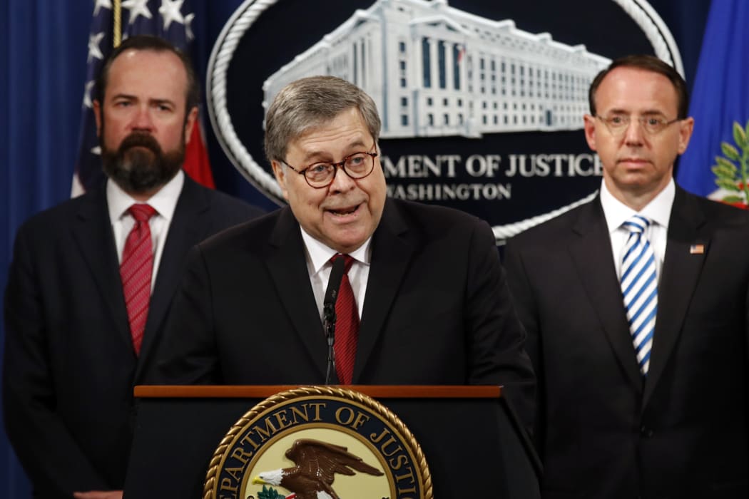Attorney General William Barr speaks alongside Deputy Attorney General Rod Rosenstein, right, and acting Principal Associate Deputy Attorney General Edward O'Callaghan, left, about the release of a redacted version of special counsel Robert Mueller's report.
