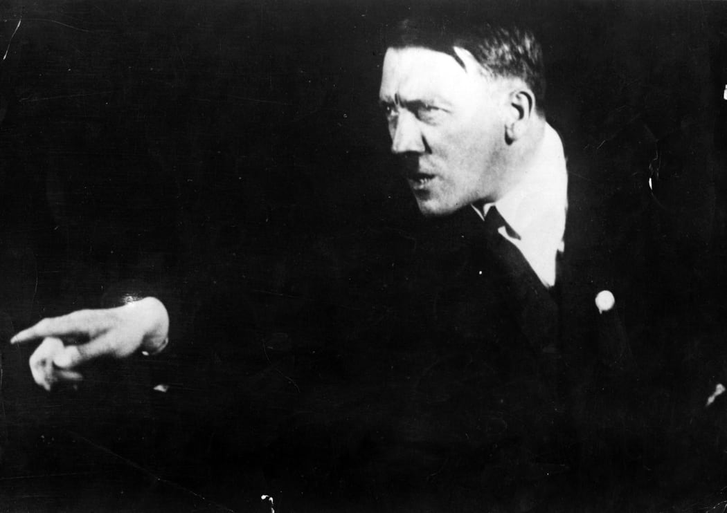 Adolf Hitler rehearsing a speech in front of the mirror, in 1933.