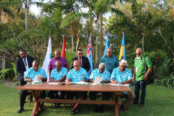 MSG leaders sign the two declarations after their retreat at Havana Boat Shed, North Efate.