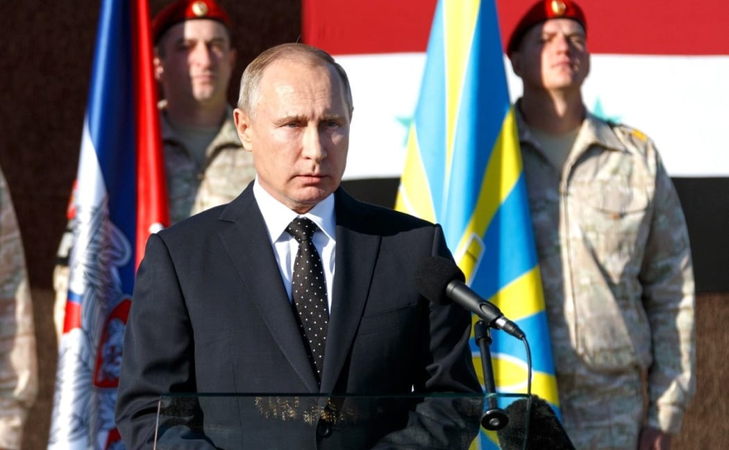 Russia's president Vladimir Putin on a suprise visit to Hmeimim airbase, near Latakiato, Syria.