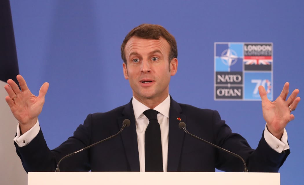 France's President Emmanuel Macron gives a press conference at the NATO summit at the Grove hotel in Watford, northeast of London on December 4, 2019. (Photo by LUDOVIC MARIN / AFP)