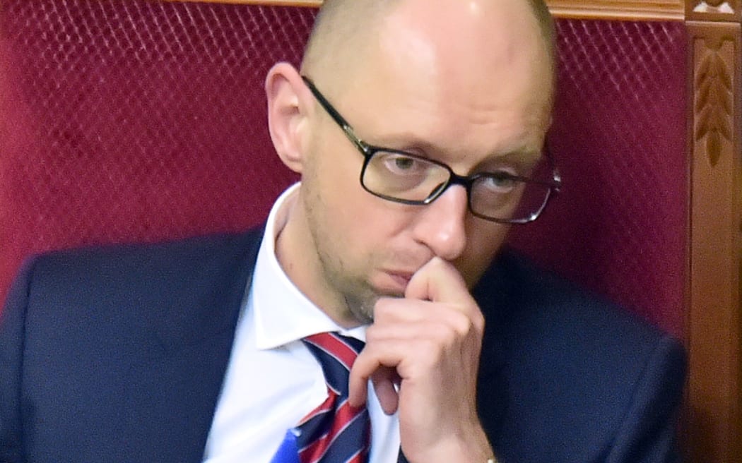 Ukrainian Prime Minister Arseniy Yatsenyuk waits to hear the result of the vote of no confidence against him in February.
