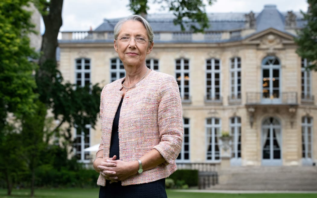 (FILES) French Prime minister Elisabeth Borne poses in the garden of the Hôtel de Matignon, the official residence of the Prime Minister of France, on May 31, 2022 in Paris. French Prime Minister Elisabeth Borne has tendered her resignation from the government, French President Emmanuel Macron has accepted it, announced the presidency on January 8, 2024. (Photo by JOEL SAGET / AFP)