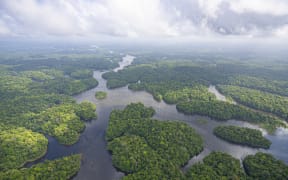 Lac de petit saut, Sinnamary, French Guiana. (Photo by Vincent Premel / Biosphoto / Biosphoto via AFP)
