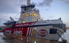 This handout picture released by the Spanish humanitarian NGO Proactiva Open Arms on March 9, 2024 shows the vessel, also called Open Arms, docked in the Cypriot port of Larnaca. A spokeswoman for Open Arms, a charity whose boat docked three weeks ago in the Cypriot port of Larnaca, said "everything will be ready to be able to set sail" later on March 9. The Spanish aid group has partnered with US charity World Central Kitchen to prepare the first aid delivery via the sea route that the EU Commission hopes will open this weekend. (Photo by PROACTIVA OPEN ARMS / AFP)