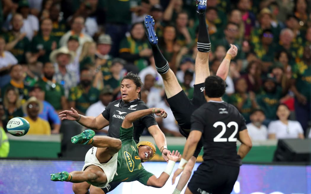 Beauden Barrett of New Zealand tackled by Kurt Lee Arendse of South Africa during the Rugby Championship match between South Africa and New Zealand, at Mbombela Stadium.