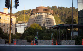 Police keep watch in Wellington on 3 March after a massive operation to clear the illegal occupation off Parliament grounds.
