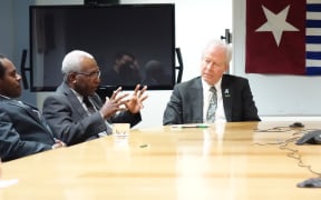 The secretary-general of the United Liberation Movement for West Papua, Octo Mote, talks to New Zealand MPs.