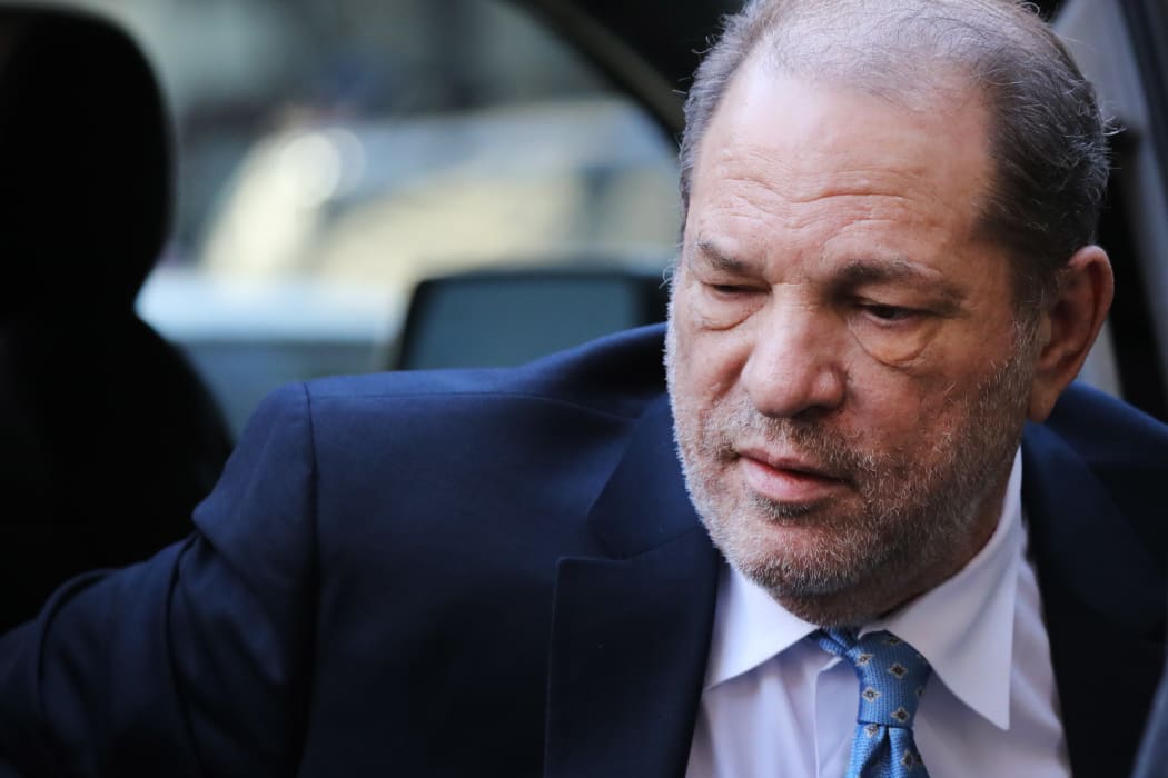 Harvey Weinstein enters a Manhattan court house as a jury continues with deliberations in his trial on 24 February 2020.