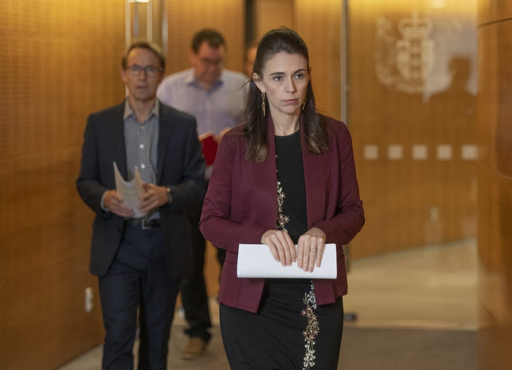 Prime Minister Jacinda Ardern and Director-General of Health Dr Ashley Bloomfield arriving for their Covid-19 update media conference at Parliament, Wellington, on Day 33 of the Covid-19 coronavirus lockdown. 27 April, 2020.