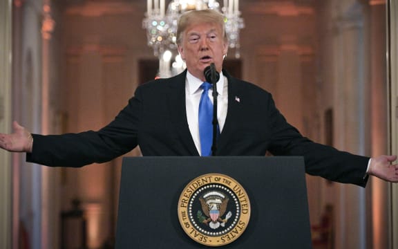US President Donald Trump speaks during a post-election press conference in the East Room of the White House in Washington, DC on November 7, 2018. (Photo by Jim WATSON / AFP)