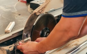 Production of cabinet furniture, sawing, materials on a format-cutting machine