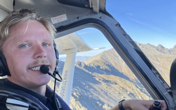 Henry Phelps at the helm of a small plane