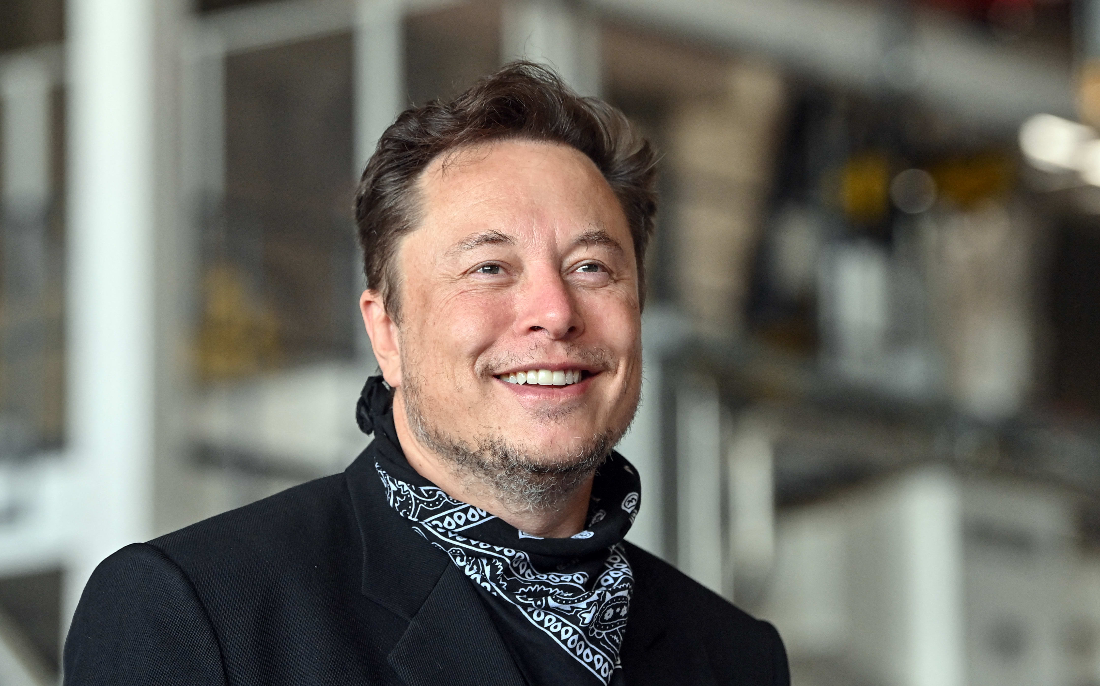 Elon Musk stands in the foundry of the Tesla Gigafactory during a press event in August, 2021.