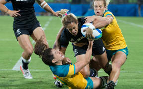 New Zealand's Kayla Ahki (nee McAlister) crashes over to score a try against Australia in the Olympic rugby sevens final in Rio in 2016.