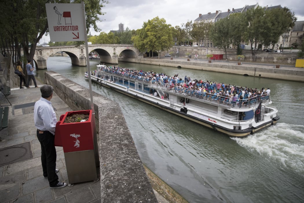 The city of Paris has begun testing "uritrottoirs", dry public urinals intended to be ecological and odorless, but that make some residents cringe.