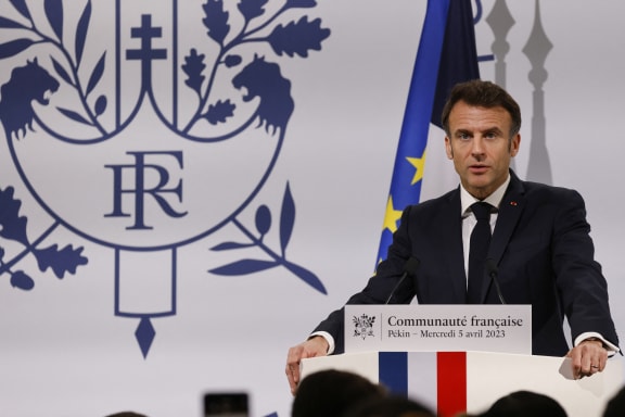 French President Emmanuel Macron speaks during a meeting with China's French community at the residence of France's ambassador in Beijing.