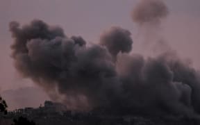 Smoke billows during the Israeli military bombardment of the northern Gaza Strip on November 14, 2023, amid the ongoing battles between Israel and the Palestinian group Hamas. More than 11,000 people have been killed in relentless Israeli bombardment of the Gaza Strip, according to the Hamas-run health ministry, since the war erupted after Palestinian militants raided southern Israel on October 7 killing at least 1200 people, according to official Israeli figures (Photo by Jack Guez / AFP)