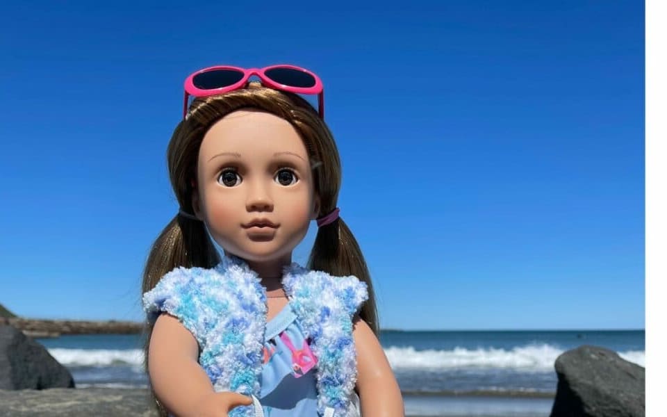 Lynn Jarvis is creating hand-made dolls clothes, and doing photoshoots around Wellington to keep in touch with her granddaughter Alyssa.