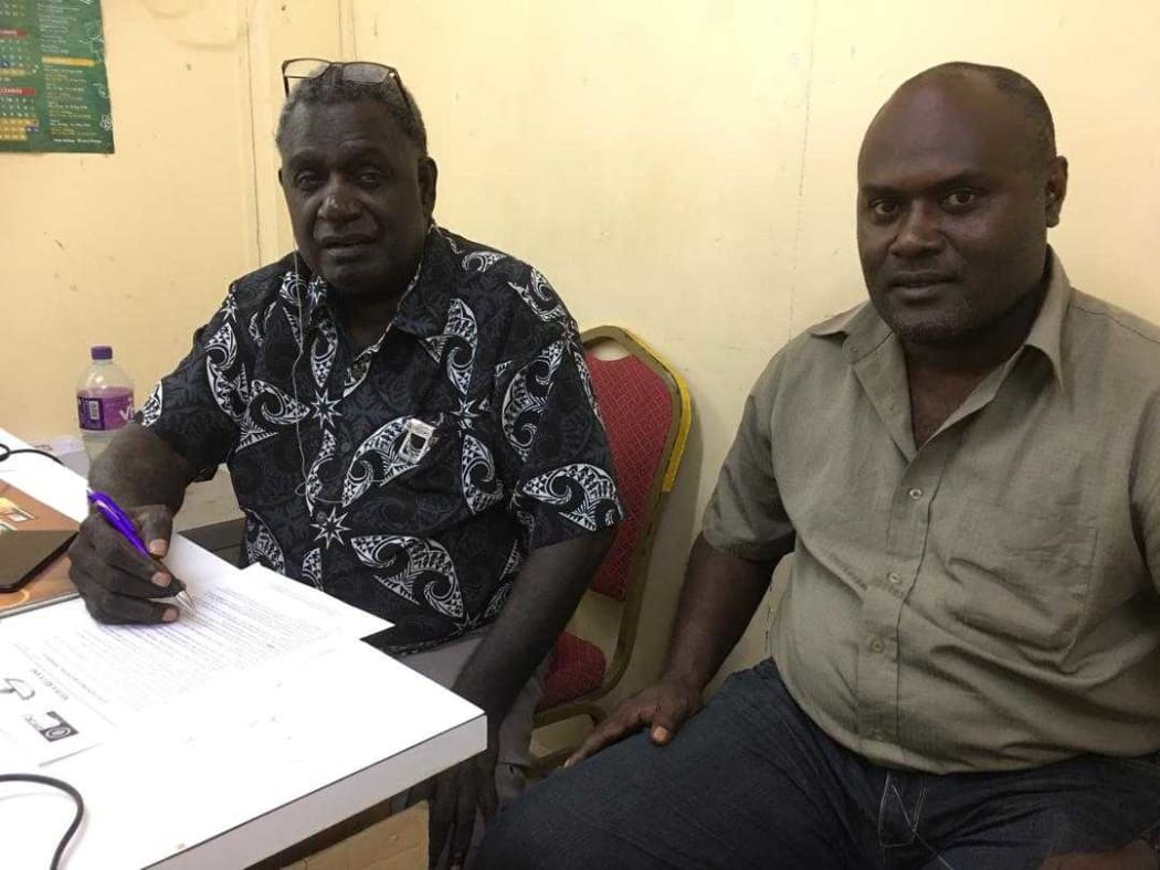 Bougainville's electoral commissioner George Manu and acting election manager George Kenatsi (February 2020)