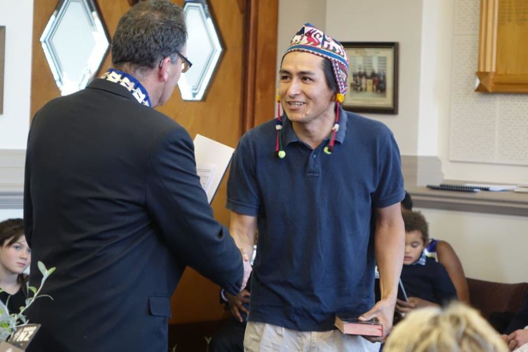 Daniel Villarroel Coca from Bolivia is welcomed as a West Coast citizen by Buller Mayor Garry Howard.