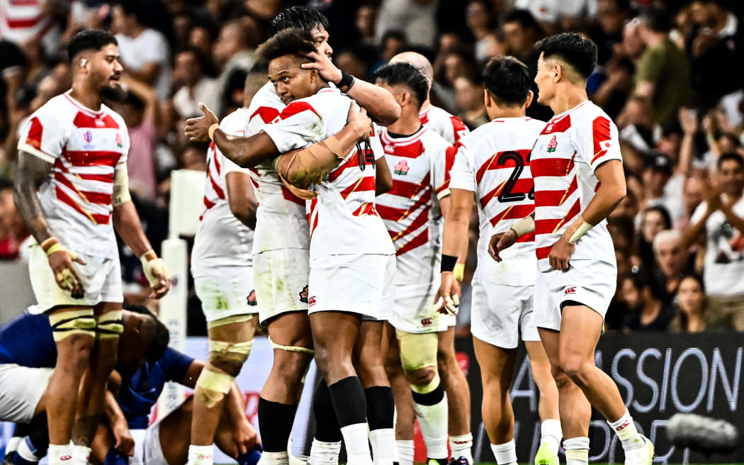 Japan celebrate a win over Samoa in 2023.