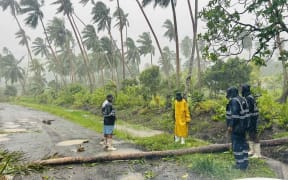 Police officers in the Northern Division (Tukavesi/Taveuni) assisting members of the public as Tropical Cyclone Rae impacts the country.