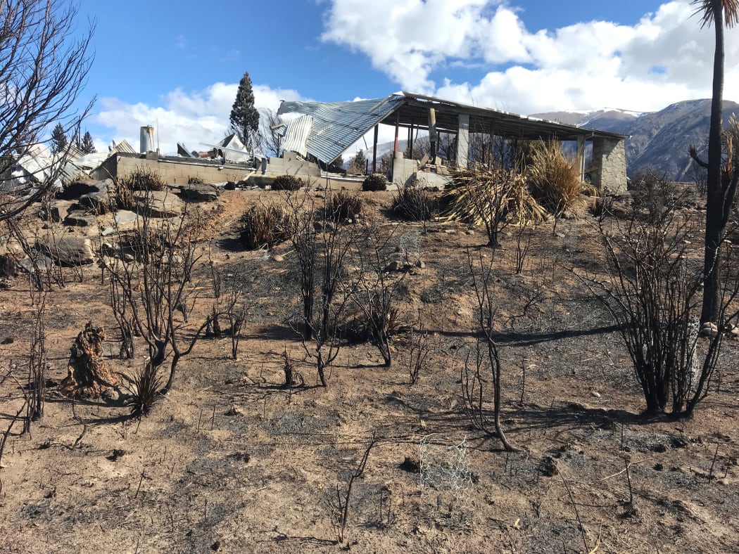 The framework is all that remains of this Lake Ōhau Village home.