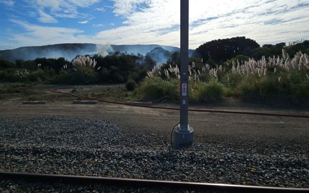 The vegetation fire near Paremata train station in Porirua.