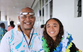 Wale Tobata standing proudly with his daughter Jordan Evans-Tobata