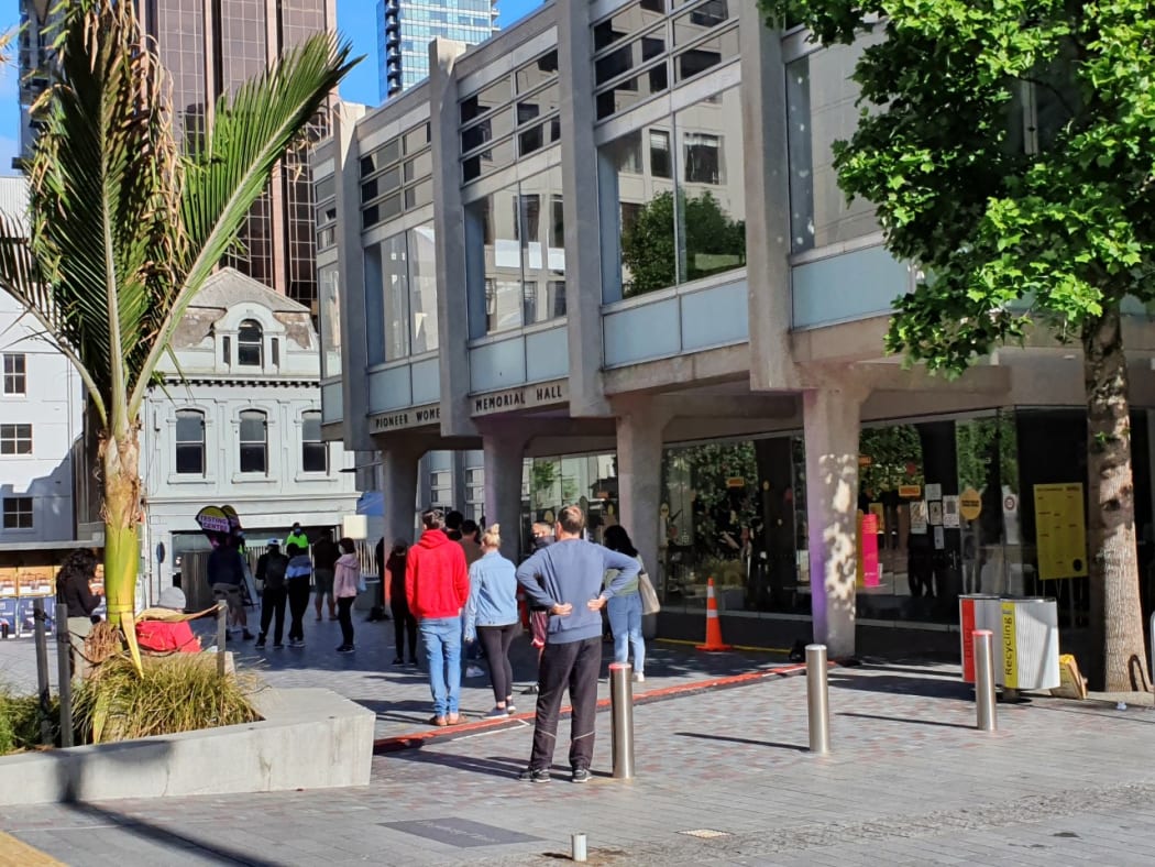 People wait in line at a pop-up Covid-19 testing centre at Freyberg Place in Auckland's CBD on Friday 13 November.