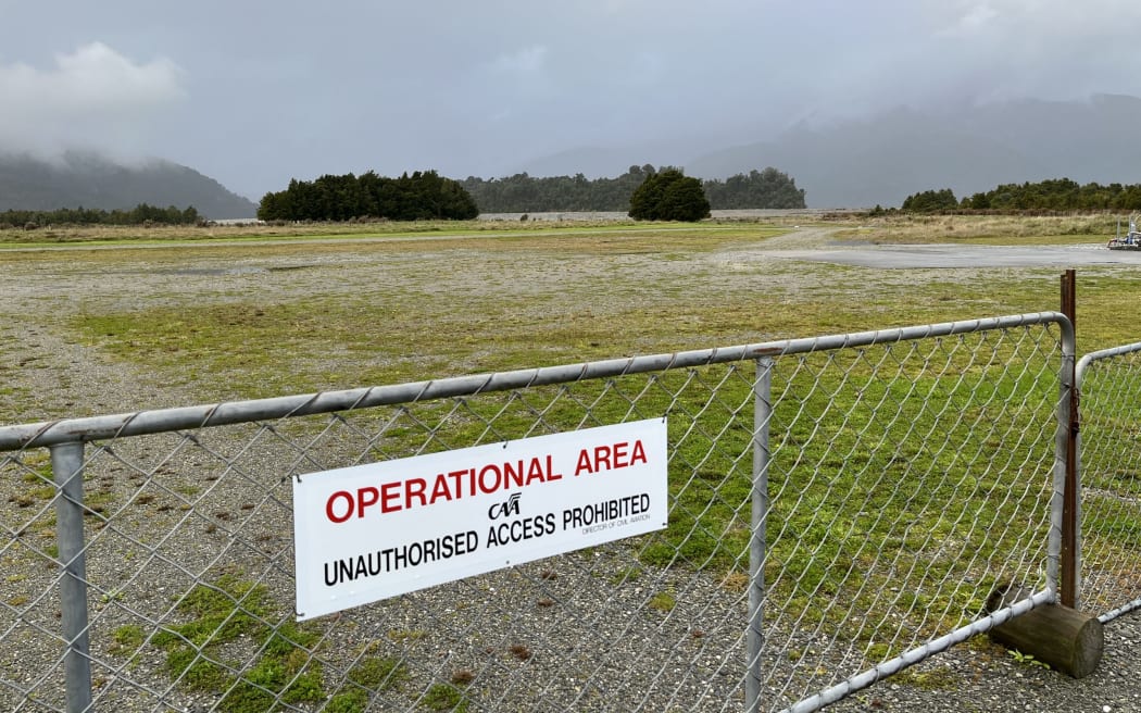 A view from the edge of the Franz Josef airstrip towards the rebuilt 'Milton' stopbank, in the background. The Waiho flowed directly through the airstrip in the 2019 flood.
