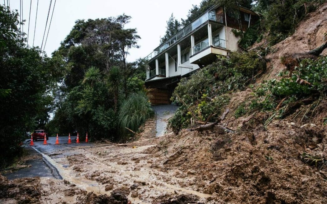 Landslides and debris from the storm blocked roads in Titirangi and damaged homes and water infrastructure.