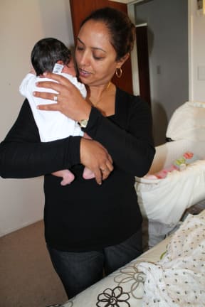 Experienced hand at comforting baby