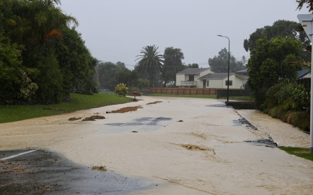 Motutara Road flooding in Ōakura.