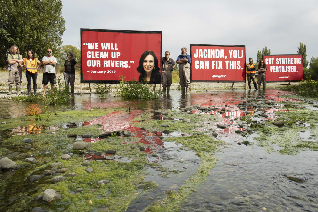 Billboards put up by Greenpeace at the Selwyn River in Canterbury.