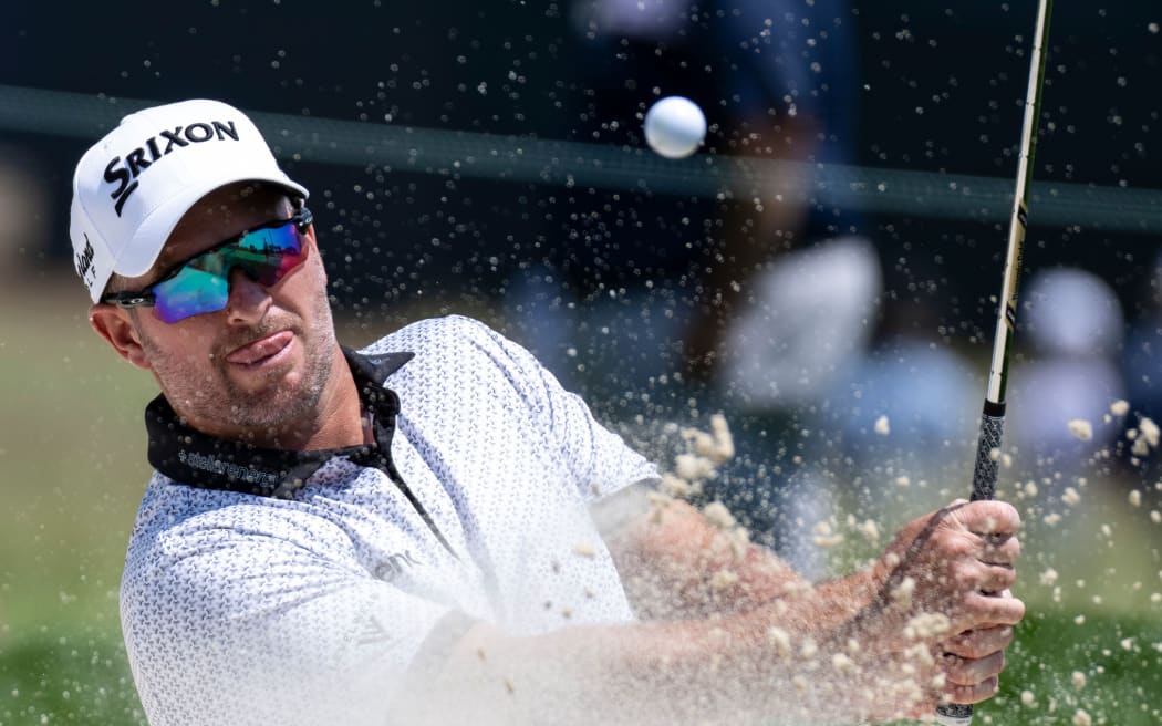 Ryan Fox plays a bunker shot at Oakmont Country Club. 2025 US Open.