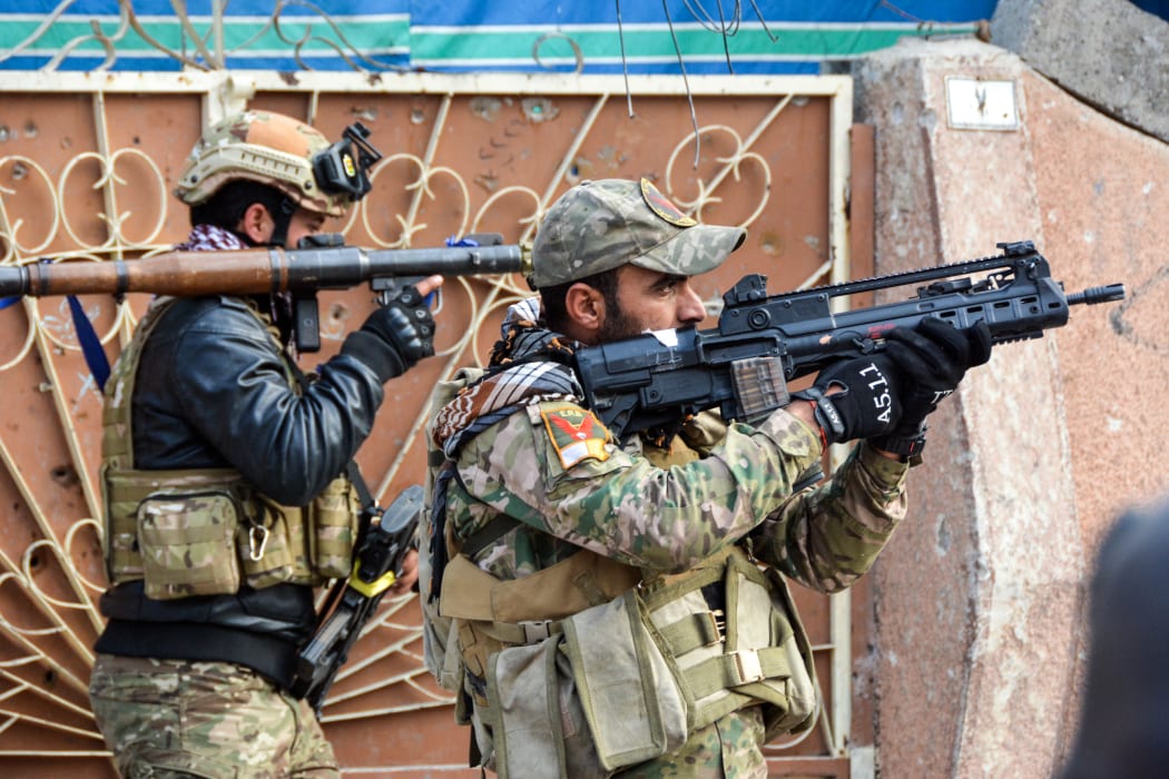 Iraqi forces take aim in Mosul in ongoing efforts to re-take the city from Islamic State.