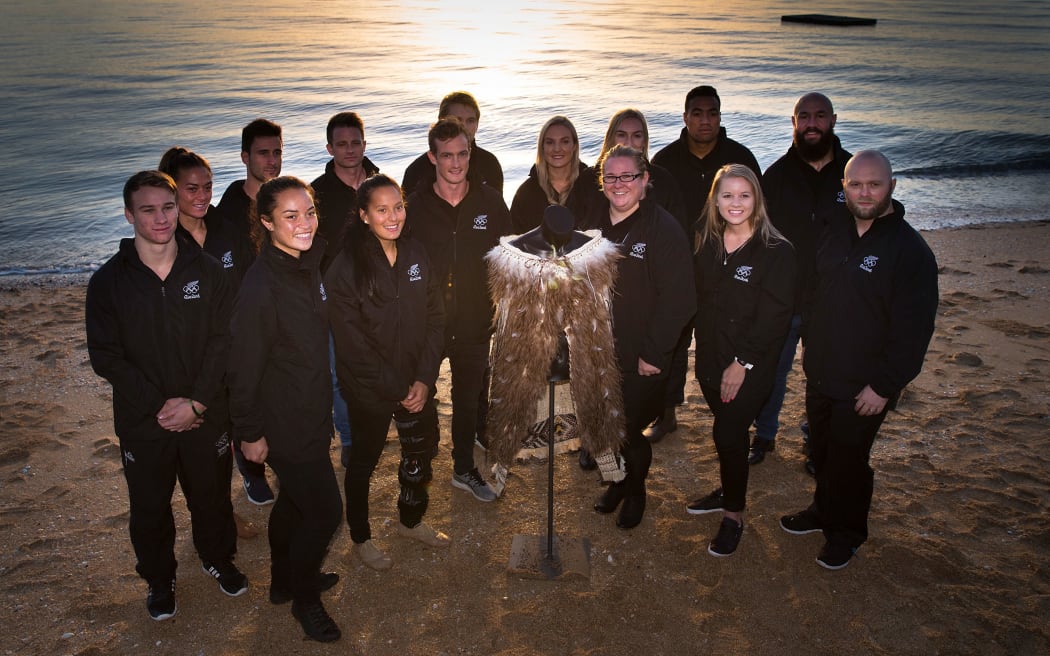 NZ athletes mark 100 days to the Rio Olympics in a sunrise beach ceremony in Auckland.