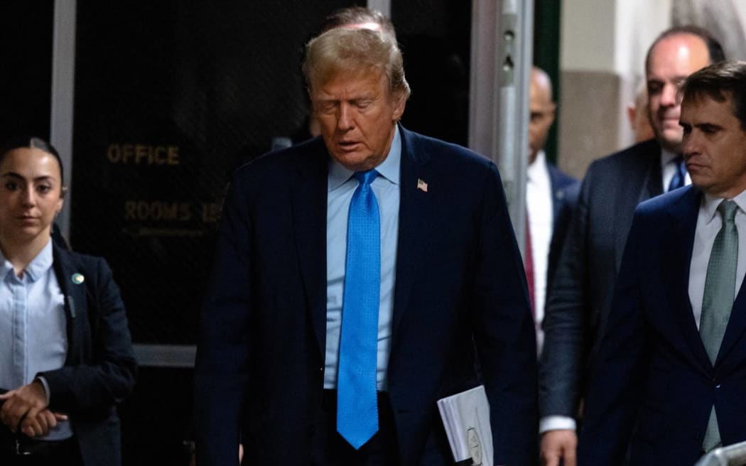 NEW YORK, NEW YORK - APRIL 26: Former U.S. President Donald Trump arrives for his hush money trial at Manhattan criminal court on April 26, 2024 in New York City. The defense will continue to cross examine David Pecker, the former National Enquirer publisher, after prosecutors finished their direct questioning. Trump faces 34 felony counts of falsifying business records in the first of his criminal cases to go to trial. Former U.S. President Donald Trump faces 34 felony counts of falsifying business records in the first of his criminal cases to go to trial.   Michael M. Santiago/Getty Images/AFP (Photo by Michael M. Santiago / GETTY IMAGES NORTH AMERICA / Getty Images via AFP)