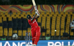 Hamilton Masakadza drives a delivery from Morne Morkel during the ICC World Twenty20 Pool C match between South Africa and Zimbabwe in Hambantota, Sri Lanka on the 20th September 2012