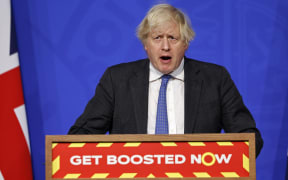 Britain's Prime Minister Boris Johnson speaks at a press conference to update the nation on the Covid-19 booster vaccine program on 15 December.