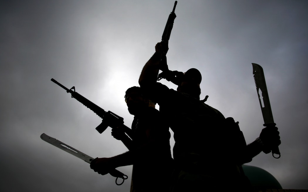 Iraqi fighters from the Saraya al-Salam (Peace Brigades) leaving Najaf to head to the northern Iraqi city of Tikrit to continue the offensive against Islamic State (IS) group jihadists.