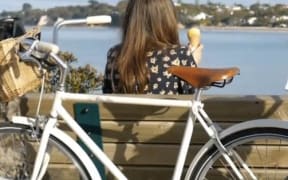 A picture of Alice Harbourne on a bike