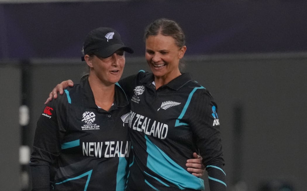 Suzie Bates (R) and Sophie Devine (L) of New Zealand celebrate their win over Pakistan at the 2024 T20 World Cup in UAE.