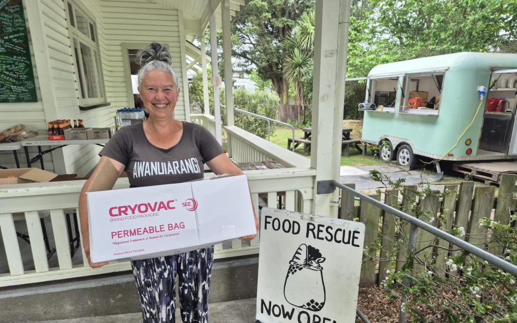 Haana Wilcox with a box of venison she's donating to feed the community.