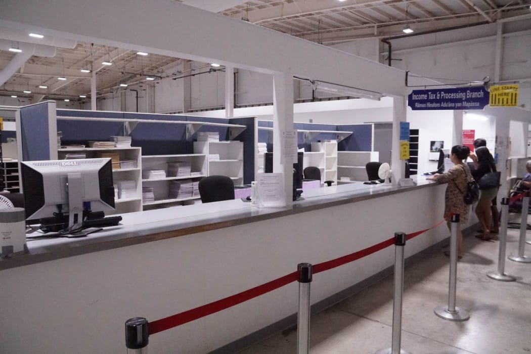 TAX CUTS: It was a slow morning at the Department of Revenue and Taxation Income Tax Processing Branch counter, Monday, Nov. 13. The local government could see business tax revenues drop if proposed federal tax cuts become law. David Castro/The Guam Daily Post