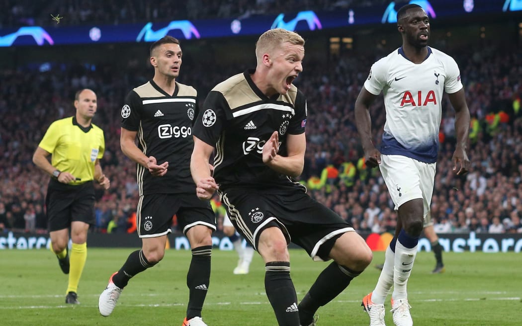 Ajax and Netherlands midfielder, Donny van de Beek (middle), has signed with Manchester United.